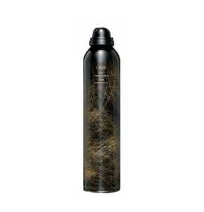 A black and gold can of Oribe Dry Texturizing Spray, featuring a sleek design with a black cap and subtle branding details.